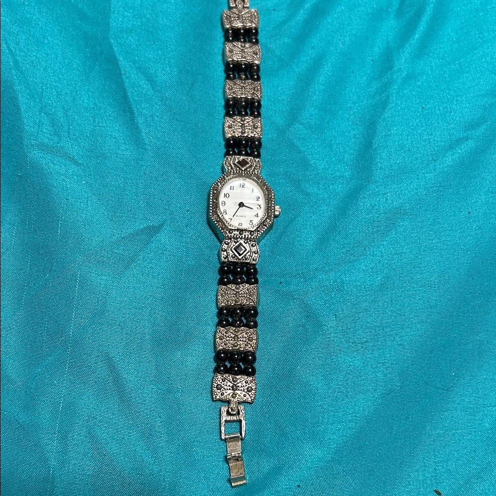 Avon Elegant Silver and Black Women's Watch